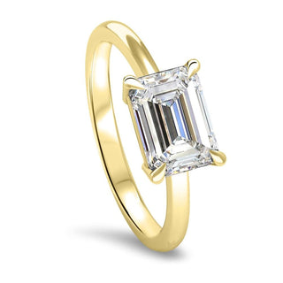 Timeless 1.0ct emerald solitaire moissanite ring angled view showing its sparkle