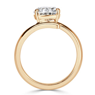 Pear moissanite open solitaire engagement ring on hand