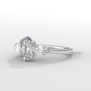 Three stone oval moissanite engagement ring close up