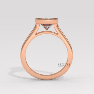 Rose gold oval cut moissanite ring on hand  Oval Bezel detail view 7