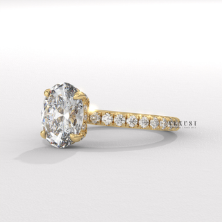 Top-down view of a oval cut moissanite engagement ring with a pave band