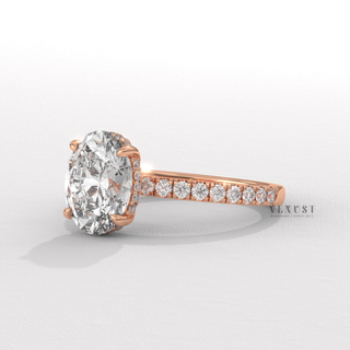 Hidden halo oval moissanite engagement ring close up