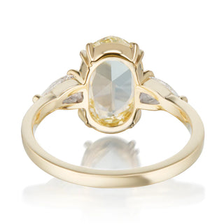 Rose cut moissanite ring with oval center stone detail