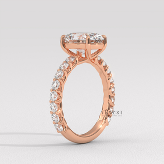 Oval cut moissanite ring on hand