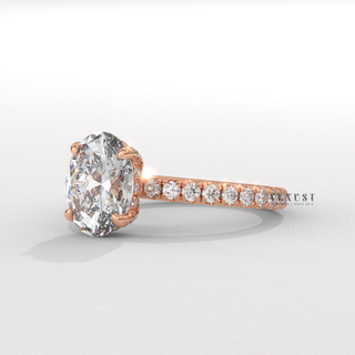 Front view of a oval cut moissanite engagement ring with a pave band