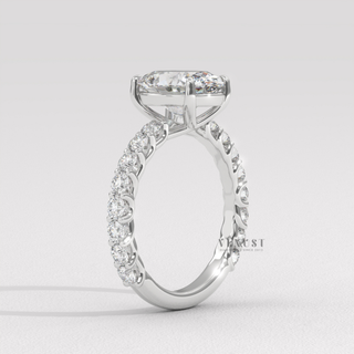 Oval engagement ring with 3/4 pave setting