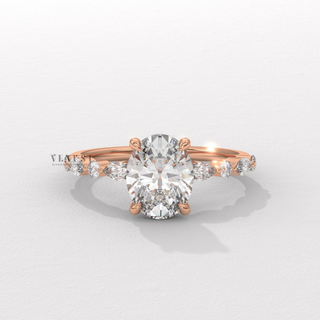 Oval cut moissanite engagement ring with marquise accents