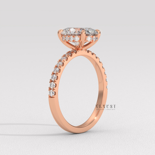 Macro shot of the centre stone on a oval cut moissanite engagement ring with a hidden halo and half pave band