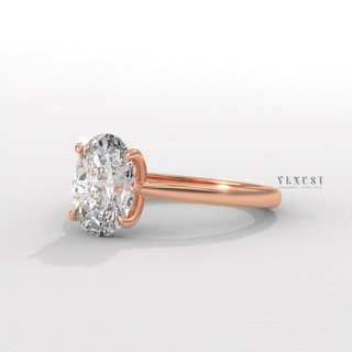 Oval cut ring with graceful center stone