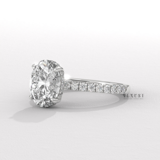 Oval cut moissanite ring with half pave setting
