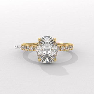 Profile shot of a oval cut moissanite engagement ring with a hidden halo and half pave band and its band