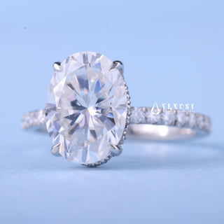 Timeless 2.0ct oval hidden halo moissanite ring angled view showing its sparkle