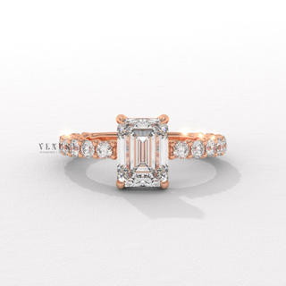 Emerald cut moissanite ring with three quarter pave detail