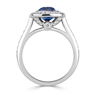Blue cushion halo moissanite engagement ring close up detail