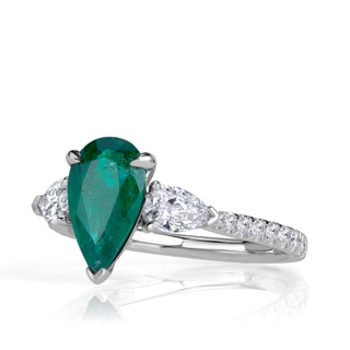 Green pear three stone moissanite engagement ring side view