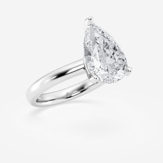 Delicate 1.0ct pear solitaire moissanite ring angled view showing its sparkle