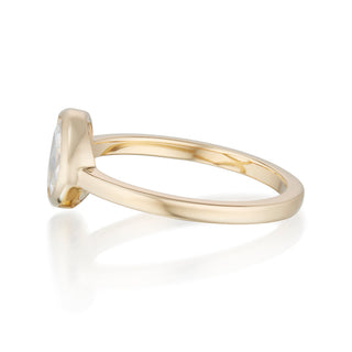 pear moissanite ring rose center bezel detail