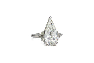 three stone moissanite engagement ring side stones close view