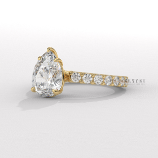 Pear cut moissanite diamond ring close up