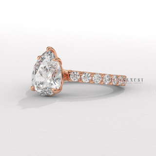 Pear moissanite engagement ring angled view