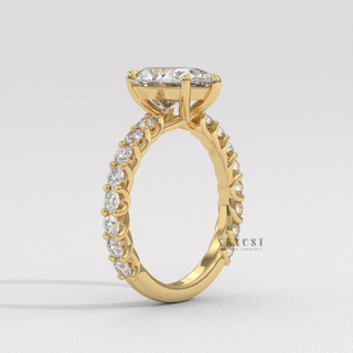 Three quarter pave pear moissanite ring detail