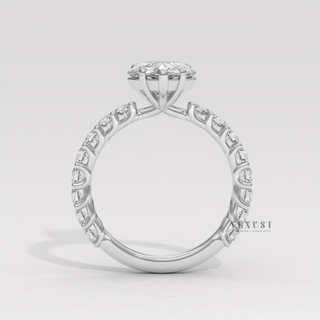 Elegant pear 3/4 pave moissanite ring design