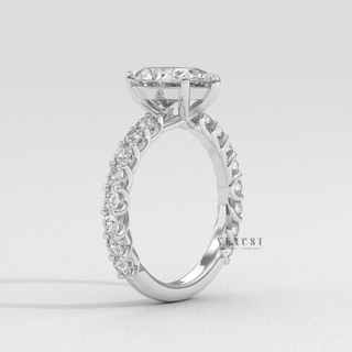 Rose gold pear cut moissanite ring top view