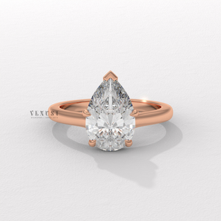 Pear cut moissanite ring with cathedral setting