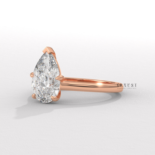 Cathedral pear moissanite ring angled view