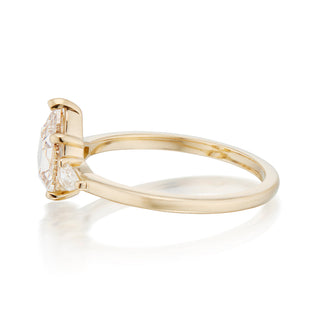 three stone moissanite ring pear center close detail