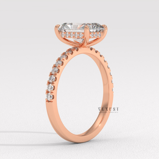 Centre-stone close-up of a radiant cut moissanite engagement ring with a hidden halo and pave band