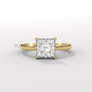 Macro shot of the centre stone on a princess cut moissanite engagement ring in a hidden halo solitaire setting