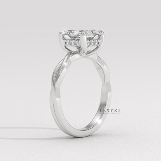 Three-quarter angle of a princess cut moissanite engagement ring on an infinity band