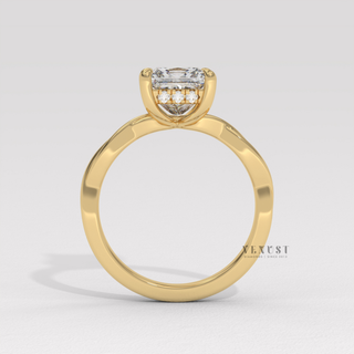 Macro shot of the centre stone on a princess cut moissanite engagement ring on an infinity band