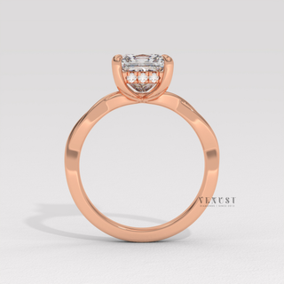Princess cut moissanite engagement ring on an infinity band worn on a hand