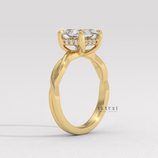 Top-down view of a princess cut moissanite engagement ring on an infinity band