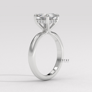Full view of a princess cut moissanite engagement ring in a hidden halo solitaire setting with band detail