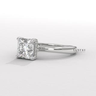 Low-angle view of a princess cut moissanite engagement ring in a hidden halo solitaire setting