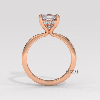 Front view of a princess cut moissanite engagement ring in a hidden halo solitaire setting