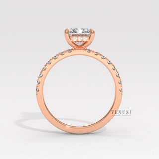 Profile shot of a radiant cut moissanite engagement ring with a hidden halo and pave band and its band