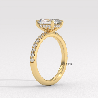 Centre-stone close-up of a radiant cut moissanite engagement ring with a pave band