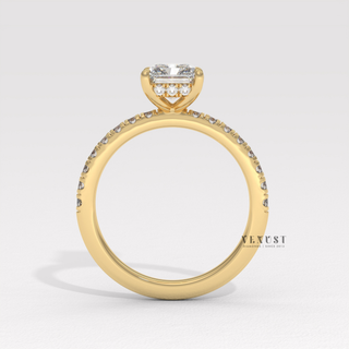 Profile shot of a radiant cut moissanite engagement ring with a pave band and its band
