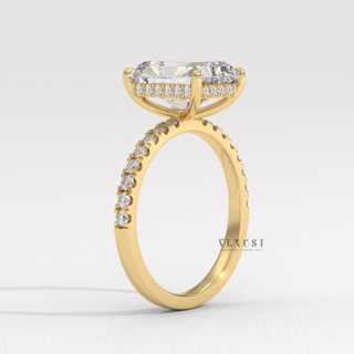 Radiant cut moissanite engagement ring with a hidden halo and pave band worn on a hand