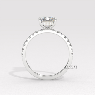 Full view of a radiant cut moissanite engagement ring with a hidden halo and pave band with band detail