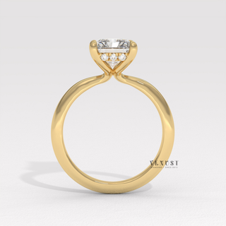 Side profile of a radiant cut moissanite engagement ring in a hidden halo solitaire setting