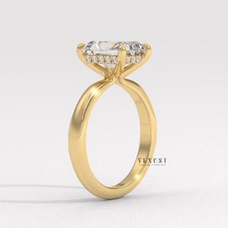 Profile shot of a radiant cut moissanite engagement ring in a hidden halo solitaire setting and its band