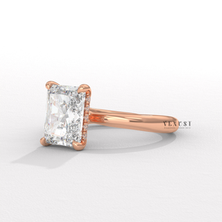 Low-angle view of a radiant cut moissanite engagement ring in a hidden halo solitaire setting