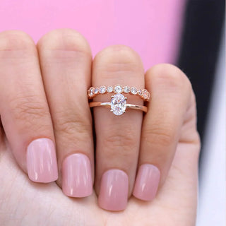 Brilliant 1.33ct oval solitaire moissanite ring angled view showing its sparkle