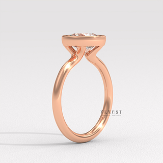 Elegant round bezel moissanite ring design