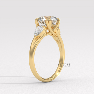 Round brilliant three stone engagement ring on hand